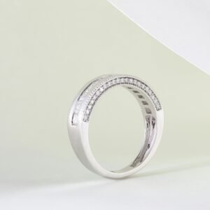 Close-up of an elegant silver ring adorned with diamonds on a minimalist background, perfect for luxury jewelry themes.